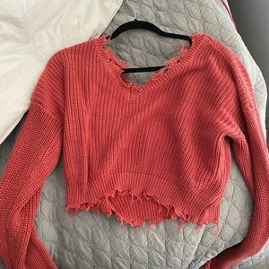Frayed sweater